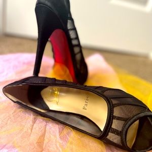Christian Louboutin black net heels size 7.5 (google conversion)